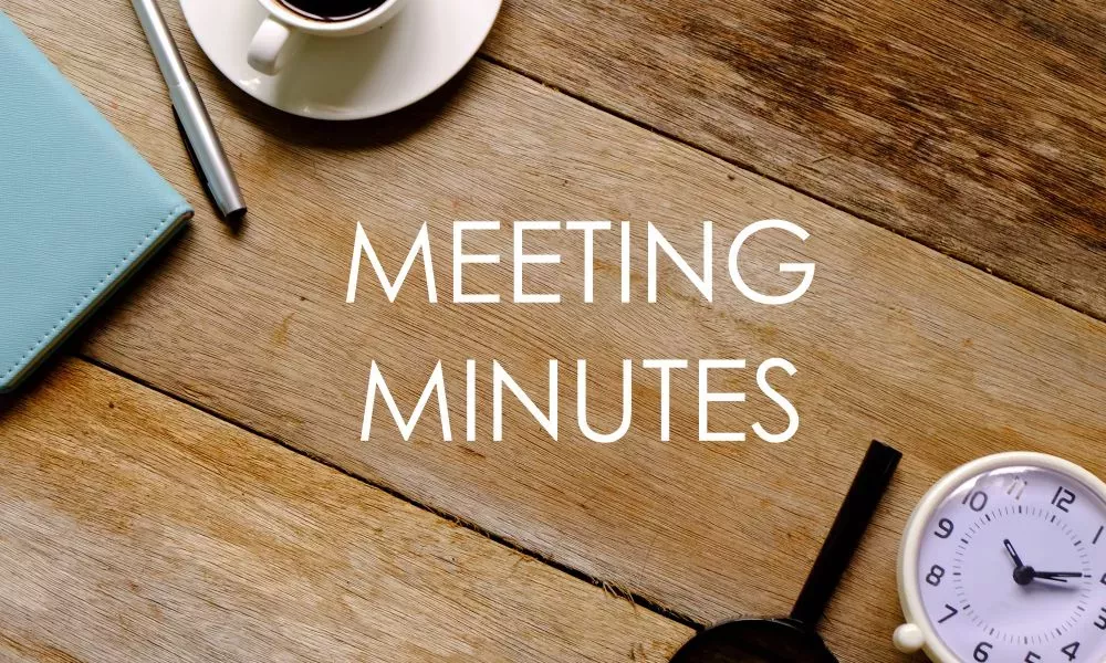 The importance of minute taking at meetings.
